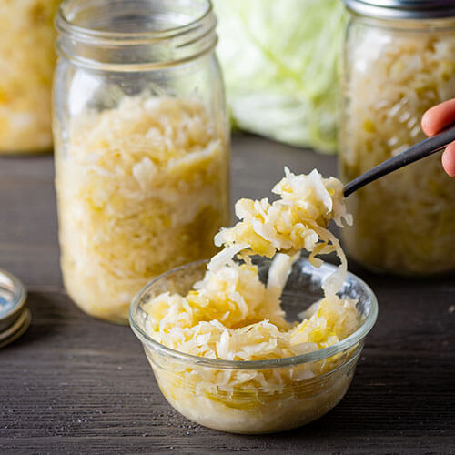 How to make old-fashioned sauerkraut in a crock? Follow this simple guide for delicious homemade fermented cabbage.